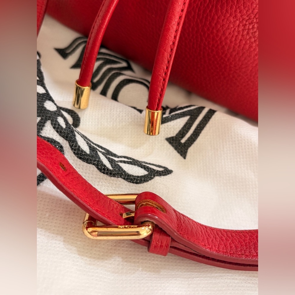 MCM Red Leather Bucket Bag
Crossbody Drawstring Gold Hardware - Picture 7 of 17